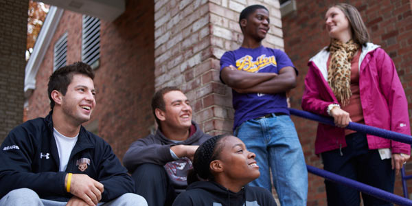 A group of Albion College students on the steps of Baldwin Hall, 2012.