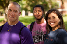 Three Albion College students photographed in 2011.
