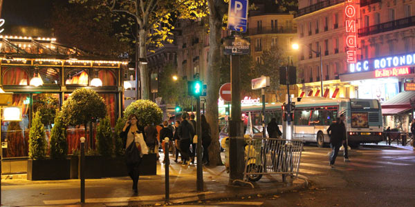 A Paris district, or arrondissement, at night.