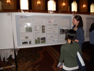Catie Castelli presenting in the poster session.