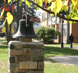The Albion College Bell sits just east of Robinson Hall.