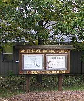 Welcome sign outside the Visitor Center of Albion College's Whitehouse Nature Center.