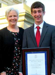 Andrew Reed receives the Frank M. Fitzgerald Public Service Award, given annually to outstanding young legislative volunteers.
