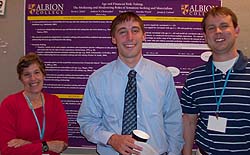 Kevin Zabel, '09, is flanked by Pam Marek, professor of psychology at Kennesaw State University and associate editor of Teaching for Psychology, and Andrew Christopher, professor of psychology at Albion College. The photograph was taken at Zabel's poster presentation during the 2009 Association for Psychological Science convention.