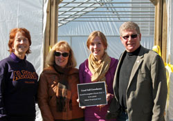 President Donna Randall, Linda, Rich and Jessie Baird at the Good Soil Growhouse dedication