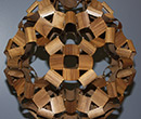 David Reimann's Studded Walnut sculpture was exhibited at the 2015 Bridges Conference. 