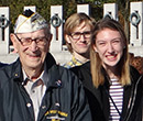 Pearl Harbor survivor Cal Calderone at the World War II Memorial in Washington, D.C., with students in Dr. Wes Dick's First-Year Seminar titled Albion & the American Dream.