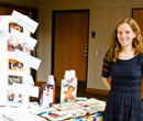 An Albion College student presents her portfolio at the 2013 Education Maymester Showcase.