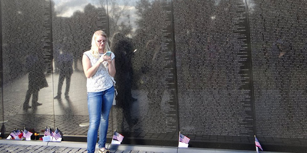 Skylar Campbell, '19, read a tribute to Lt. Donald Adamson at the Vietnam Veterans Memorial in Washington, D.C., in November 2015. 