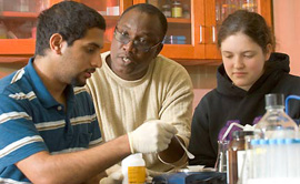 Professor Ola Olapade with Albion College biology students.