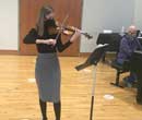 Anna Khalikova and David Abbott rehearse in Goodrich Chapel prior to their October 8 faculty duet concert.