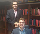 Neil Johnson, '98 (standing), with Lucas Harder, '18