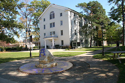 Vulgamore Hall with the Rock in foreground on the Albion College Quadrangle.